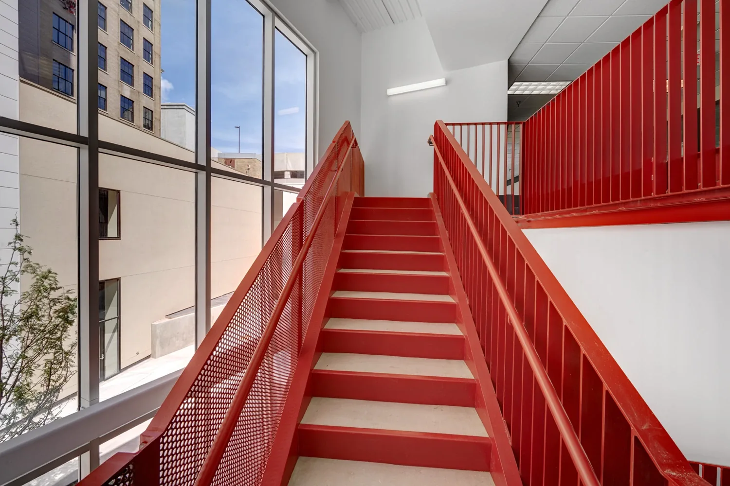 The sculptural red staircase inside the building